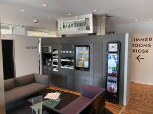 TV a/nebo společenská místnost v ubytování Hotel Arte Spreitenbach