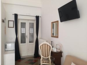 TV a/nebo společenská místnost v ubytování B&B Chimera Bari