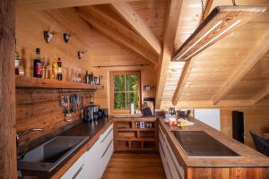 Kuchyň nebo kuchyňský kout v ubytování Chalet Risus Vallis Lachtal