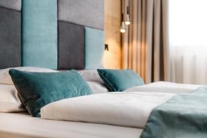 Voodi või voodid majutusasutuse Hotel Arkadia - "Adults Only" toas