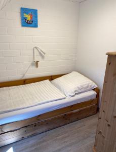 Ein Bett oder Betten in einem Zimmer der Unterkunft Ferienhaus Ostseekrabbe