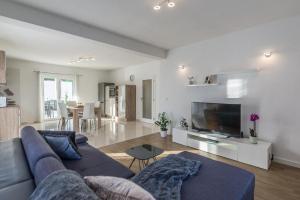 Posedenie v ubytovaní Holiday Home Bajlo apartment with three bedrooms