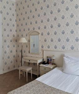 Postel nebo postele na pokoji v ubytování Hotel Rott