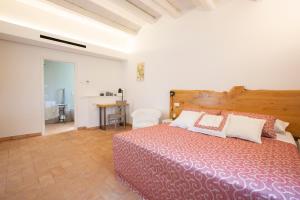 Posteľ alebo postele v izbe v ubytovaní Agriturismo Torre del Marino