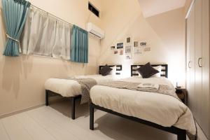 SORAPIA Villa Mt.FUJI Front tesisinde bir odada yatak veya yataklar
