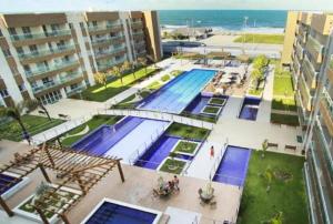 - une vue sur la piscine d'un complexe dans l'établissement VG FUN 131 Praia do Futuro, à Fortaleza