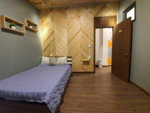 Postel nebo postele na pokoji v ubytování Lightning House 2
