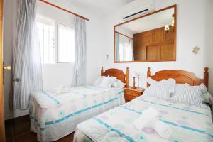 Posteľ alebo postele v izbe v ubytovaní Villa Cornocalejo SpainSunRentals 1003