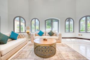 A seating area at Maison Privee - Luxury Upgraded 4BR Villa Prvt Beach Pool