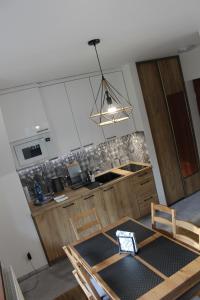 Kuchyňa alebo kuchynka v ubytovaní Apartament Antolka