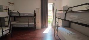 Cama ou camas em um quarto em Alojamientos Cantíber