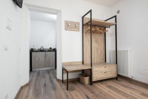 A bed or beds in a room at Le Due Torri