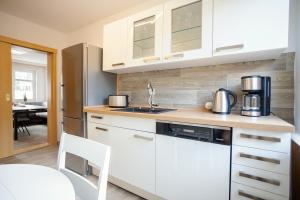 Kuchyň nebo kuchyňský kout v ubytování Ferienhaus an der Brockenbahn