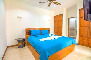 Postel nebo postele na pokoji v ubytování VIEW TALAY VILLAs POOL 155, JOMTIEN BEACH, PATTAYA