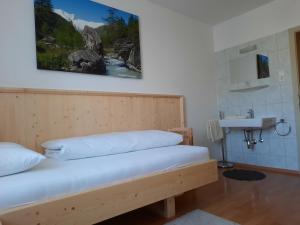 Postel nebo postele na pokoji v ubytování Gästehaus Taner
