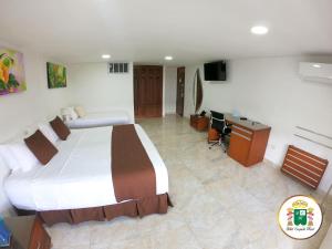 Hotel Caquetá Real HSC的电视和/或娱乐中心