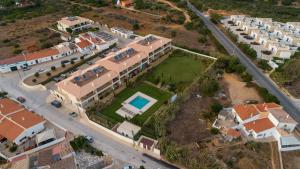 an aerial view of a house with a yard at Apartamento 7 Mares com 2 Quartos in Sagres