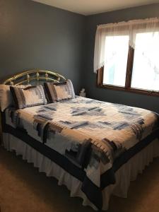 En eller flere senge i et værelse på Nordic House