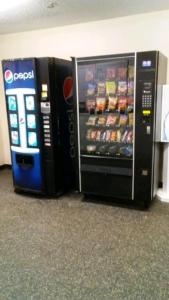two vending machines are sitting next to each other at InTown Suites Extended Stay Louisville KY - Wattbourne Lane in Louisville