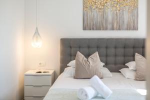 Hvar de luxe apartments 1客房内的一张或多张床位