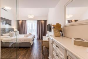 Hvar de luxe apartments 1客房内的一张或多张床位