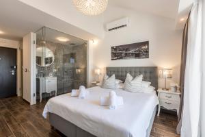 Hvar de luxe apartments 1客房内的一张或多张床位