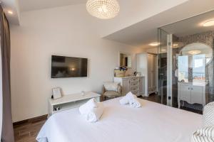 Hvar de luxe apartments 1客房内的一张或多张床位