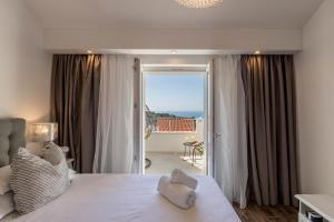 Hvar de luxe apartments 1客房内的一张或多张床位