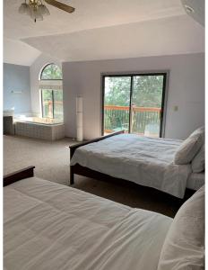 Säng eller sängar i ett rum på Mandala Springs