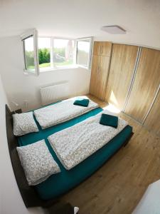 Postel nebo postele na pokoji v ubytování Apartmán Dolný Smokovec
