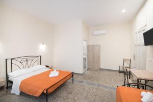 Postel nebo postele na pokoji v ubytování Athens Psiri Hotel + 32 fotografií