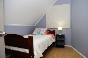 Ένα ή περισσότερα κρεβάτια σε δωμάτιο στο Apart Hotel Temuco