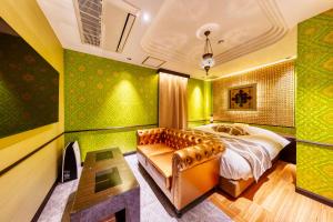 Postel nebo postele na pokoji v ubytování HOTEL Artia Izumiotsu (Adult Only)