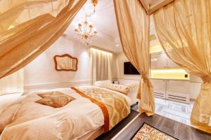 Postel nebo postele na pokoji v ubytování HOTEL Artia Izumiotsu (Adult Only)