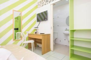 TV a/nebo společenská místnost v ubytování Alicia Tower Residences