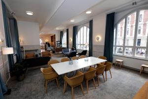 a meeting room with a table and chairs at Hotel Bethel in Copenhagen