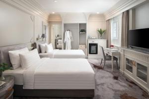 TV a/nebo společenská místnost v ubytování Kingston Suites Bangkok
