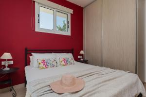 A bed or beds in a room at Gaia Beach House