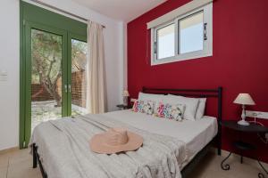 A bed or beds in a room at Gaia Beach House