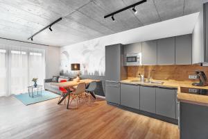 
A kitchen or kitchenette at The Cloud Suite Apartments
