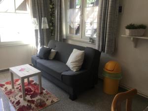 Ein Sitzbereich in der Unterkunft Ferienwohnung Rosi Stoppa