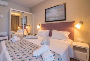 Posteľ alebo postele v izbe v ubytovaní Bio Suites Hotel & Spa