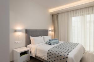 Posteľ alebo postele v izbe v ubytovaní Bio Suites Hotel & Spa