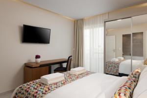 Posteľ alebo postele v izbe v ubytovaní Bio Suites Hotel & Spa