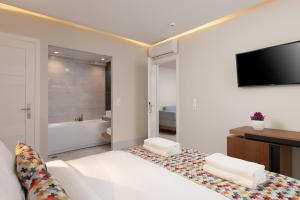 Posteľ alebo postele v izbe v ubytovaní Bio Suites Hotel & Spa