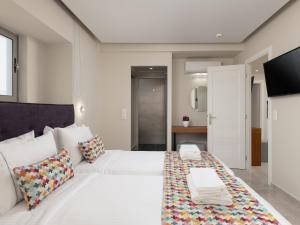 Posteľ alebo postele v izbe v ubytovaní Bio Suites Hotel & Spa