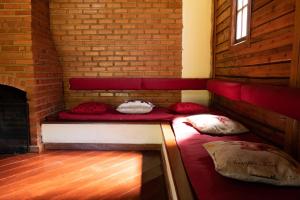 Cama ou camas em um quarto em Pousada Cabanas da Serra Lumiar