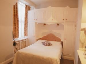 Cama o camas de una habitación en Maranton House Hotel Kensington