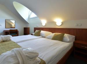 Postel nebo postele na pokoji v ubytování Spa Resort Libverda - Hotel Panorama