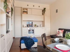 A kitchen or kitchenette at The Best Rent - Bright two rooms apartment near Cattolica University